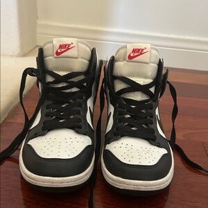 Nike Black and White High-Top Sneakers with Red Accents